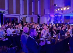 Delegates seated at round tables during Progress MartechNEXT 2026.